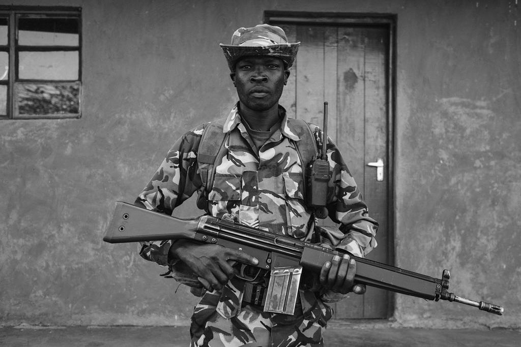 Kenya - Borana, armed rangers ready for the briefing of the night patrol