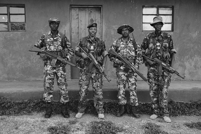 Kenya - Borana, armed rangers ready for the briefing of the night patrol