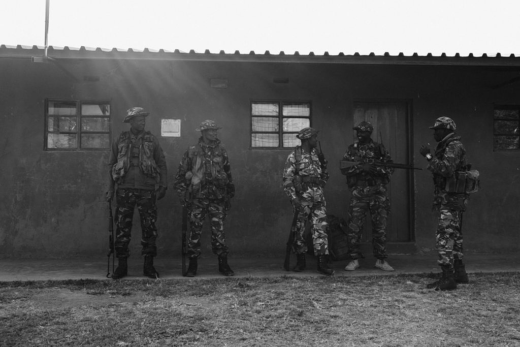 Kenya - Borana, armed rangers ready for the briefing of the night patrol