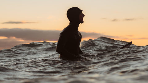 Winter surfing sunset